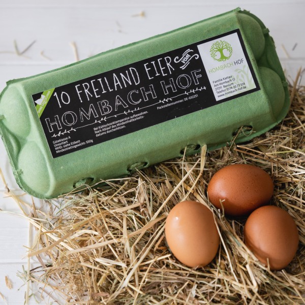 Freiland Eier im Karton auf Stroh